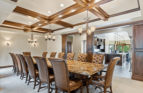 Elegant dining room seating up to 16 guests at Mansion on the Lake in Newton, WI, perfect for gatherings and business meetings