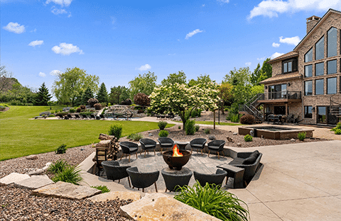 Outdoor firepit overlooking Lake Michigan at Mansion on the Lake in Newton, WI, adjacent to the Summer House, perfect for family gatherings and s’mores