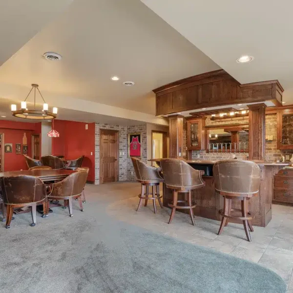 Downstairs entertainment room at Mansion on the Lake with bar and poker tables for social gatherings
